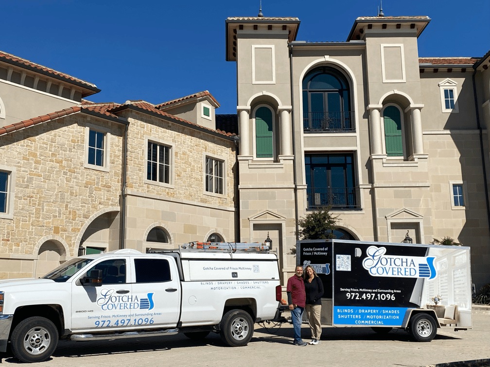 Gotcha Covered vehicle in front of a large home